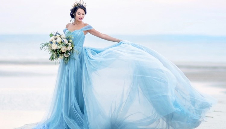 bride wearing blue wedding dress