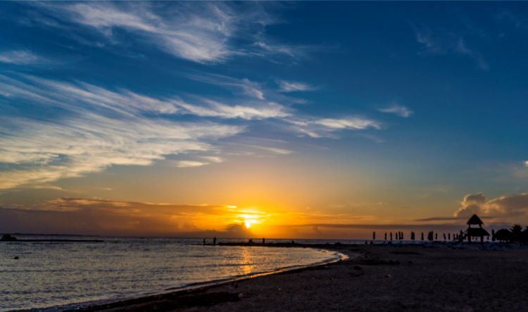 sunrise over the beach at cancun