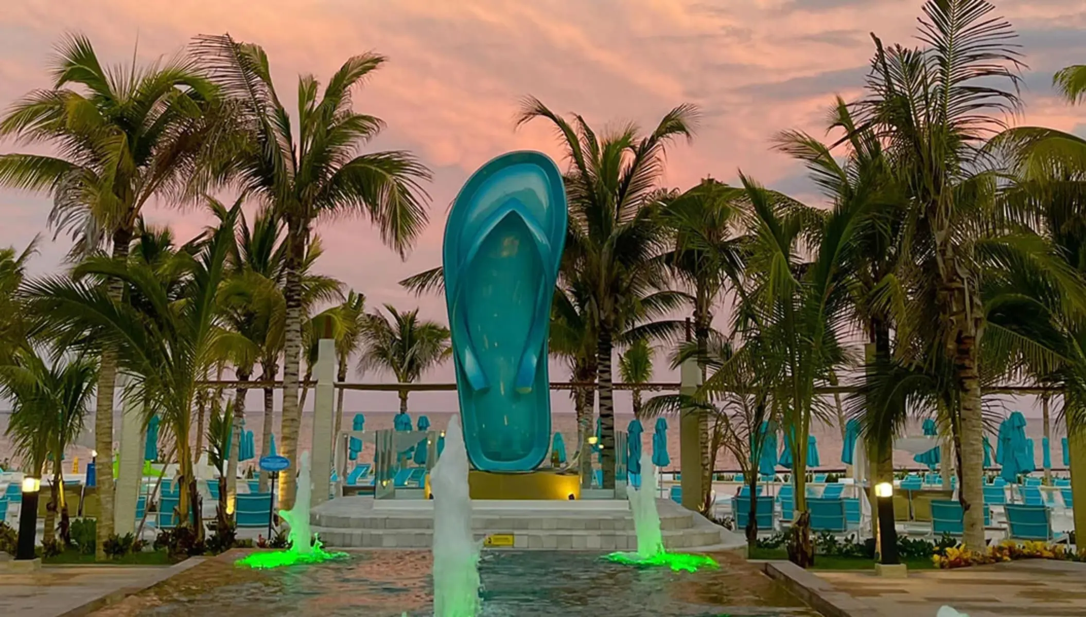 typical Margaritaville Island Reserve Riviera Maya flip flop surrounded by a water feature