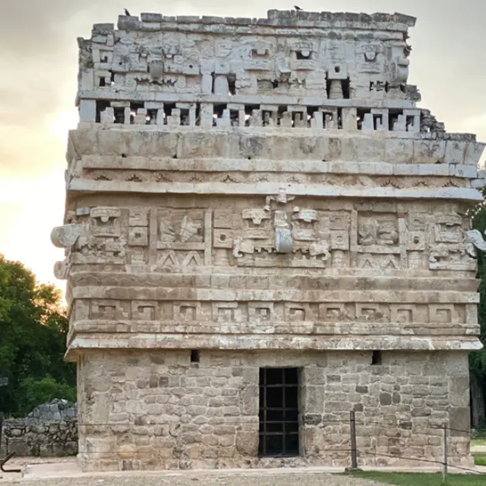 The historic Casa Monjas at Chichen Itza showcasing ancient Mayan architecture and cultural heritage.