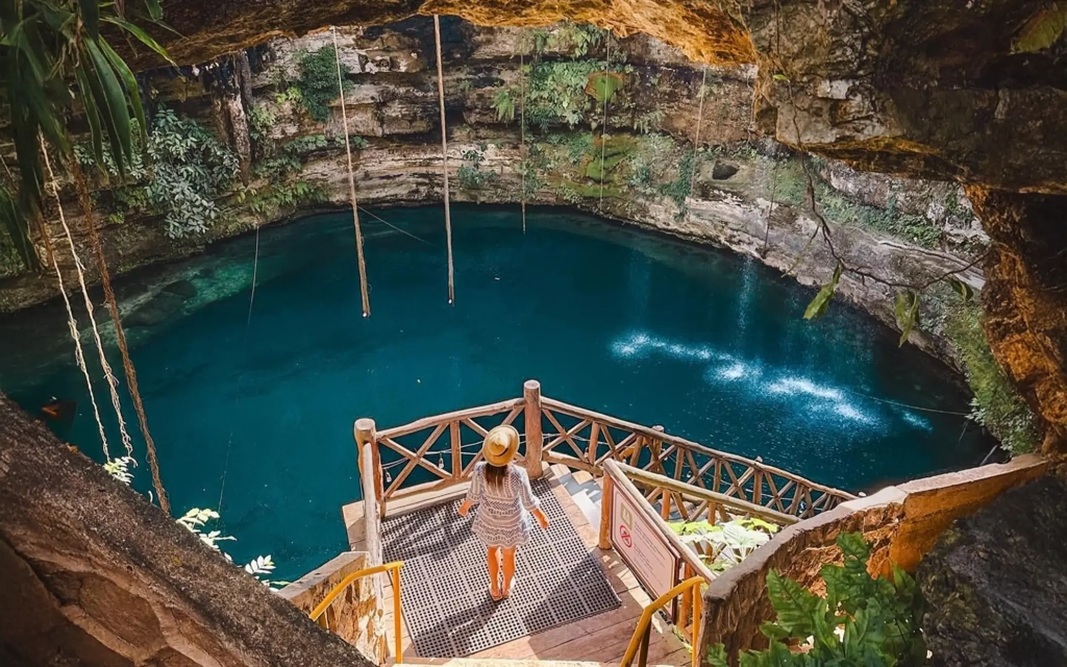 The inviting Cenote Saamal near Chichen Itza with its crystal-clear waters and natural beauty.