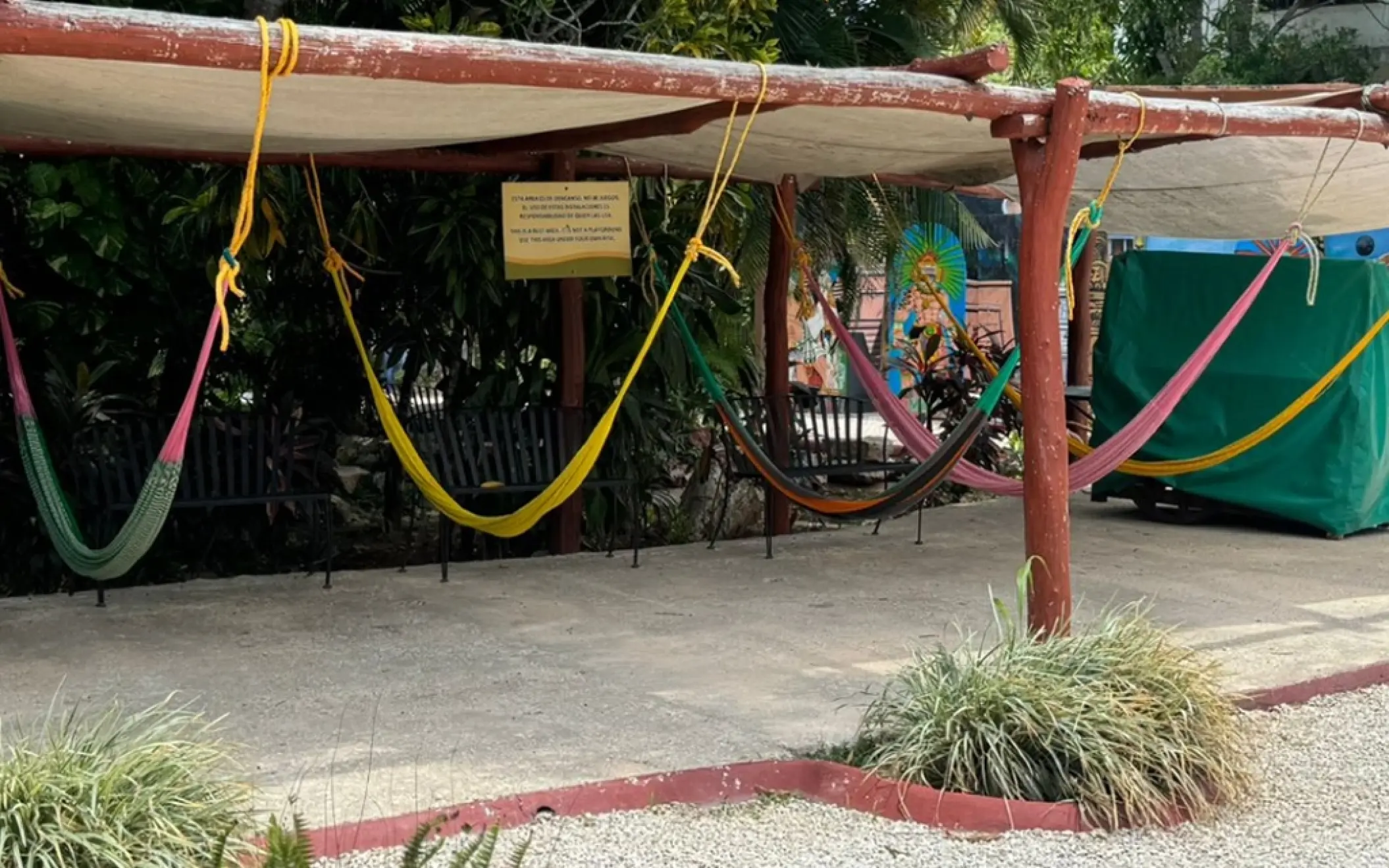 Traditional hammocks at Chichen Itza, offering a relaxing view of the lush surroundings