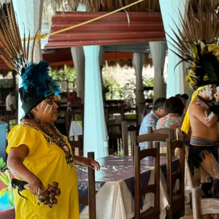 Local Mayan people sharing their traditions and cultural stories at Chichen Itza.
