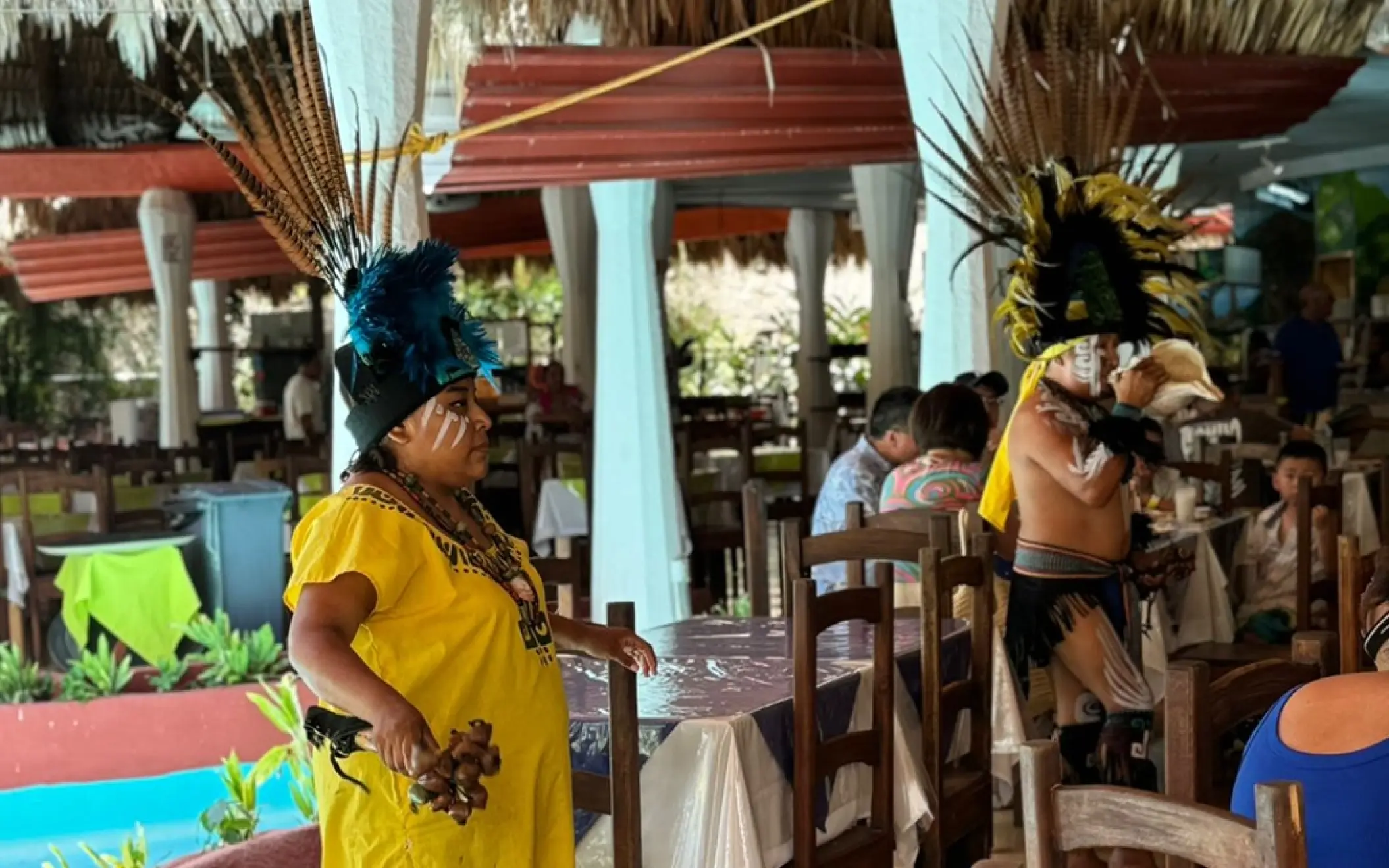 Local Mayan people sharing their traditions and cultural stories at Chichen Itza.