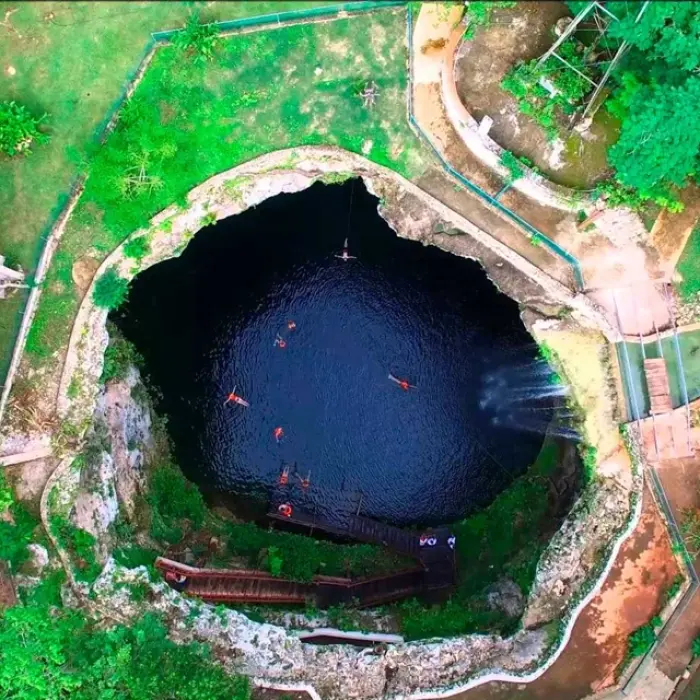 Saamal Cenote at Chichen Itza, a serene natural pool that captivates visitors with its blue waters.
