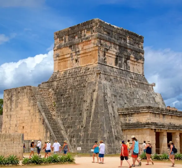 The Templo Barbado adorned with jaguar motifs and shields, symbolizing ancient Mayan power.