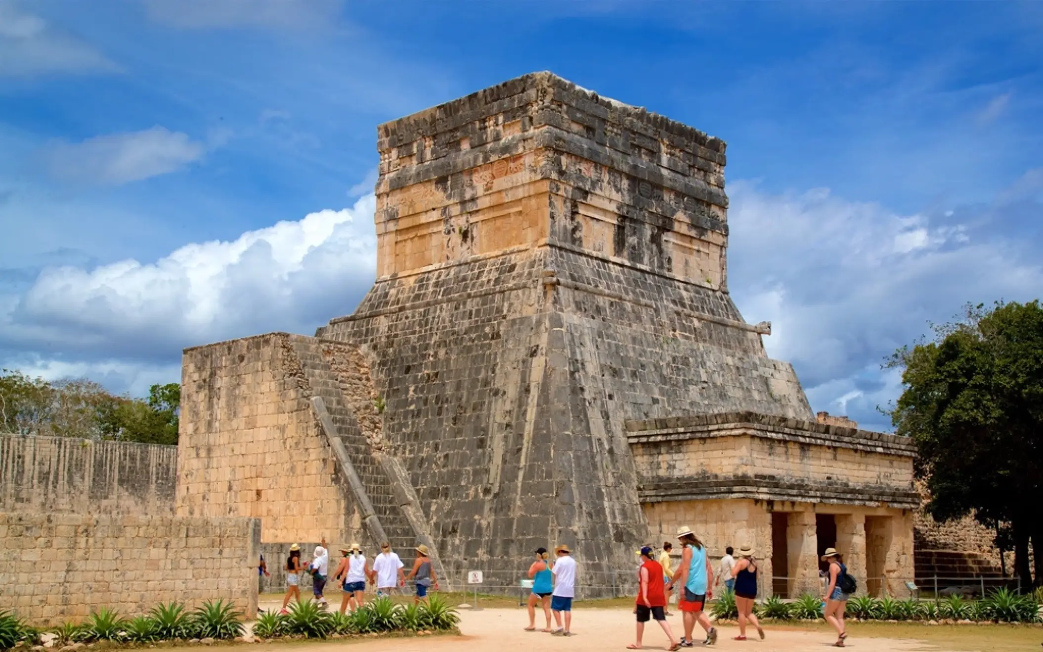 The Templo Barbado adorned with jaguar motifs and shields, symbolizing ancient Mayan power.