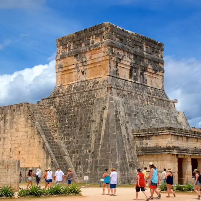 The Templo Barbado adorned with jaguar motifs and shields, symbolizing ancient Mayan power.