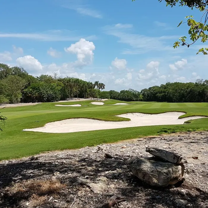 A view from the shade looking out over the wide fairways and strategically placed sand bunkers at Gran Coyote Golf Club.