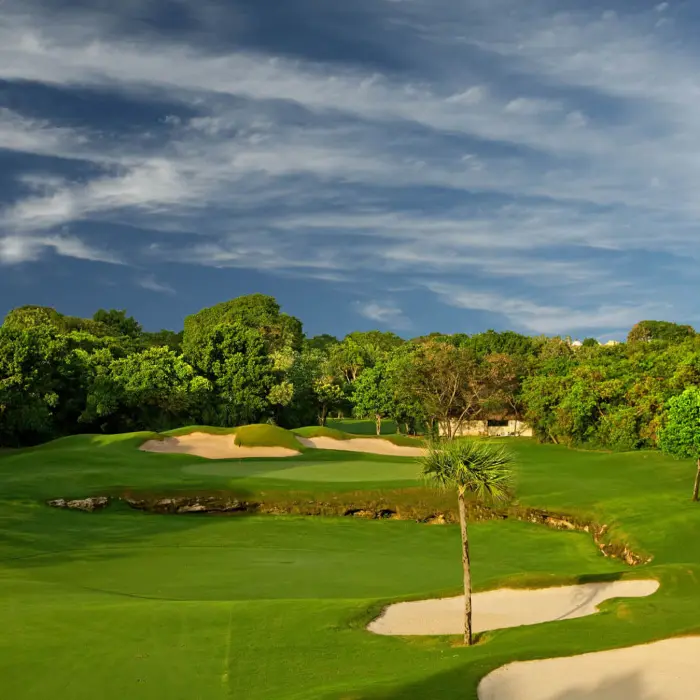 A sweeping view of the wide fairways and lush jungle landscape at the Hard Rock Golf Club in Playa del Carmen.