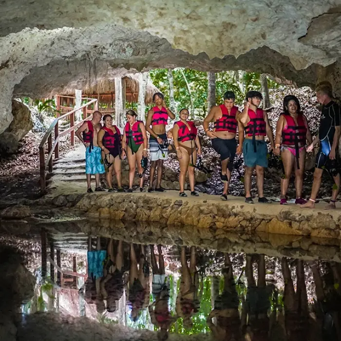 Cenote Yum Balam entrance group: Group of people with life vests at the entrance of Cenote Yum Balam