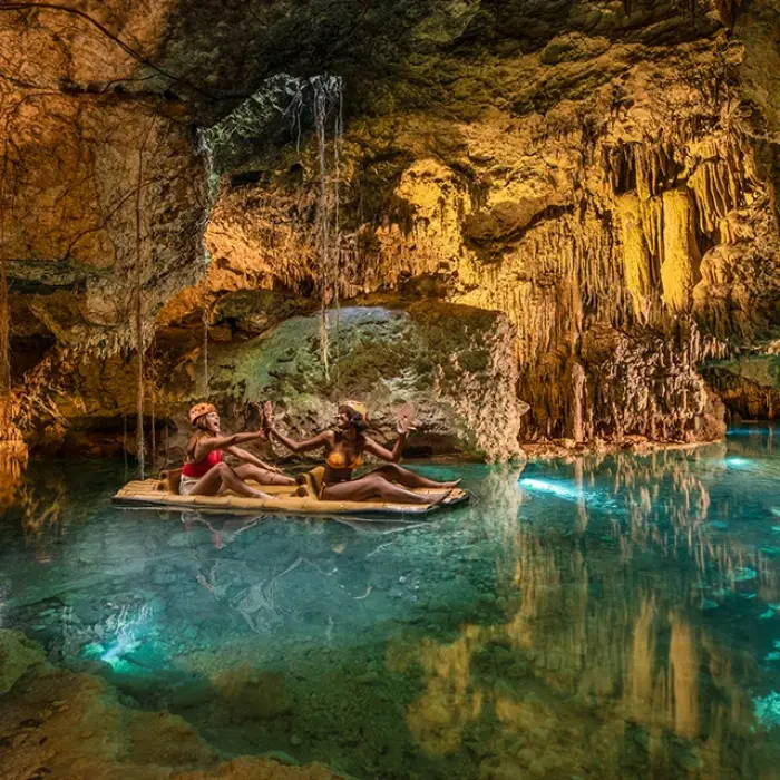 Floating peacefully inside a glowing cave river at Xplor Park