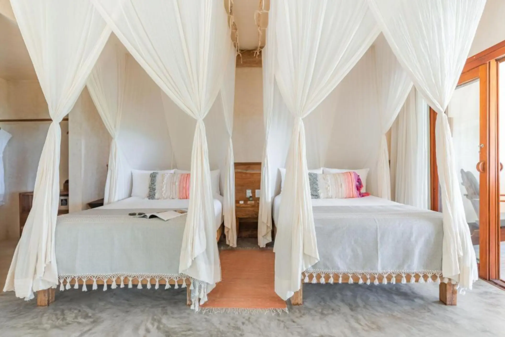 suite with two beds at Ahau Tulum