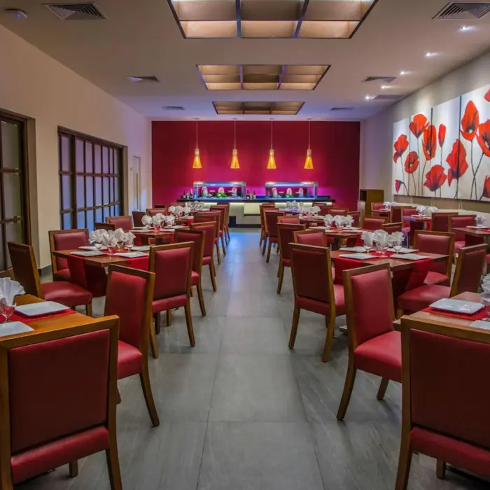 Asian restaurant at Allegro Playacar with red decor