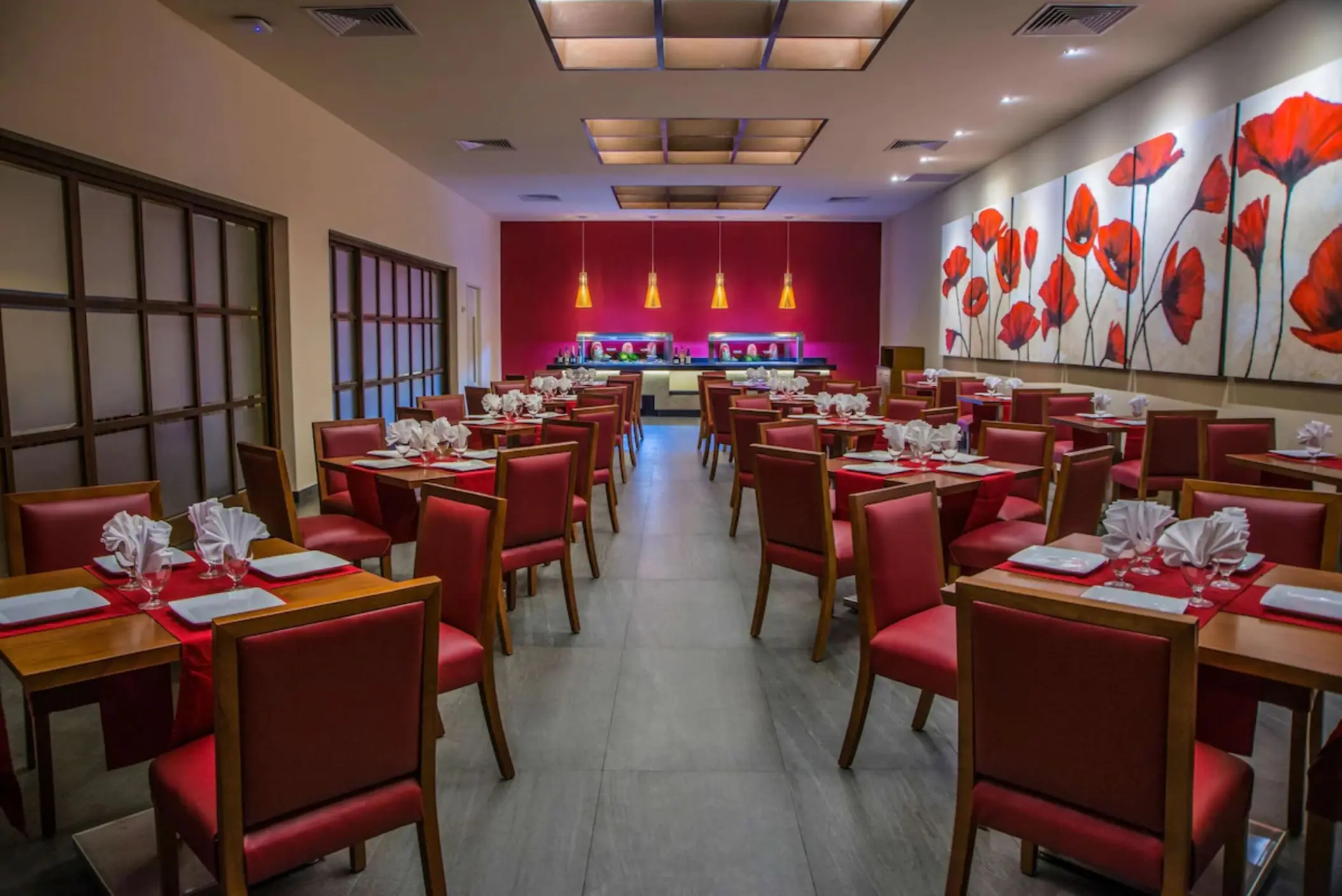 Asian restaurant at Allegro Playacar with red decor
