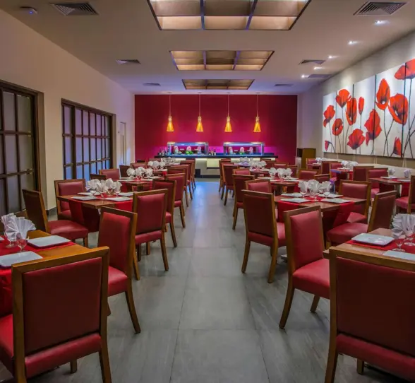 Asian restaurant at Allegro Playacar with red decor