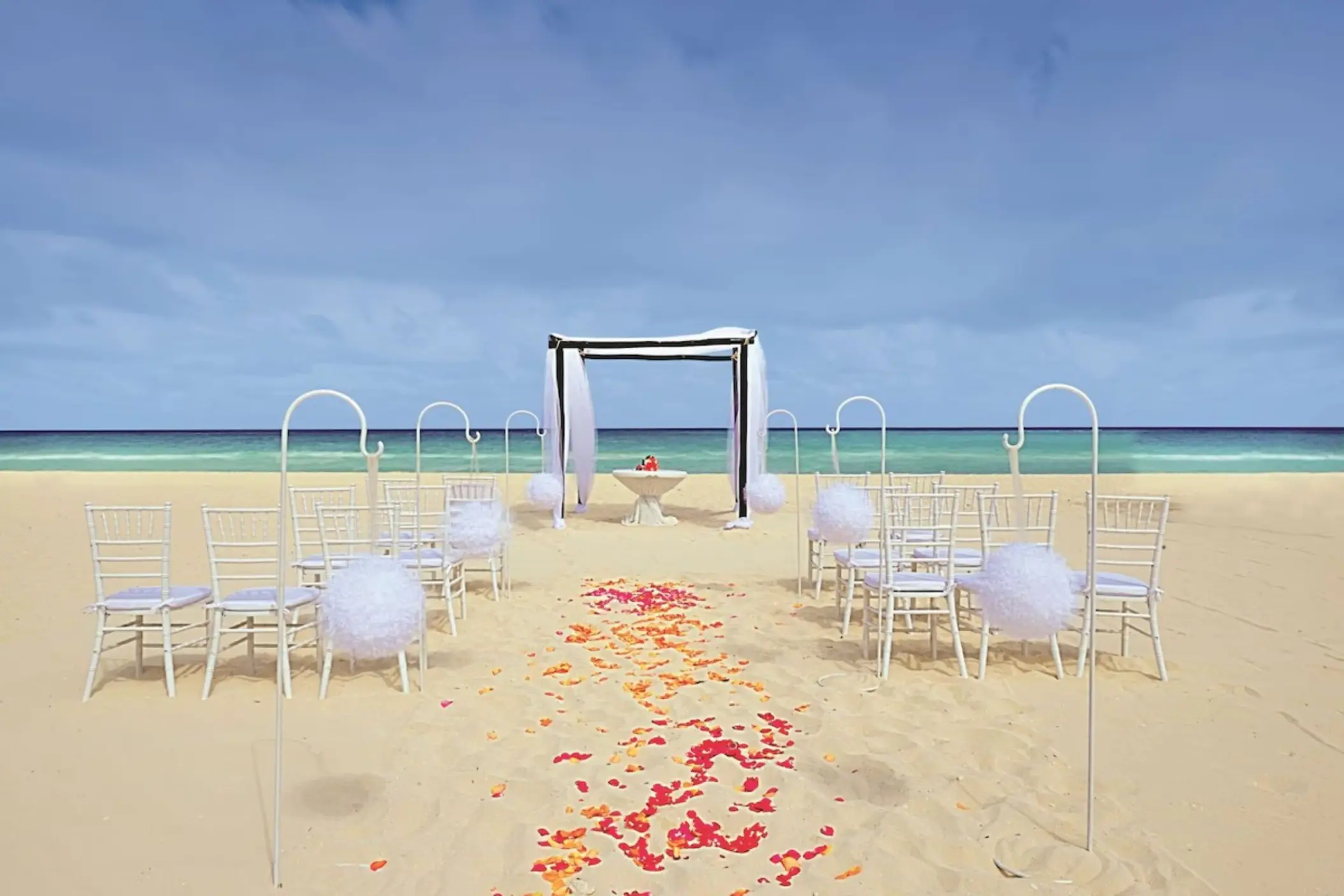 beach wedding setup at Allegro Playacar