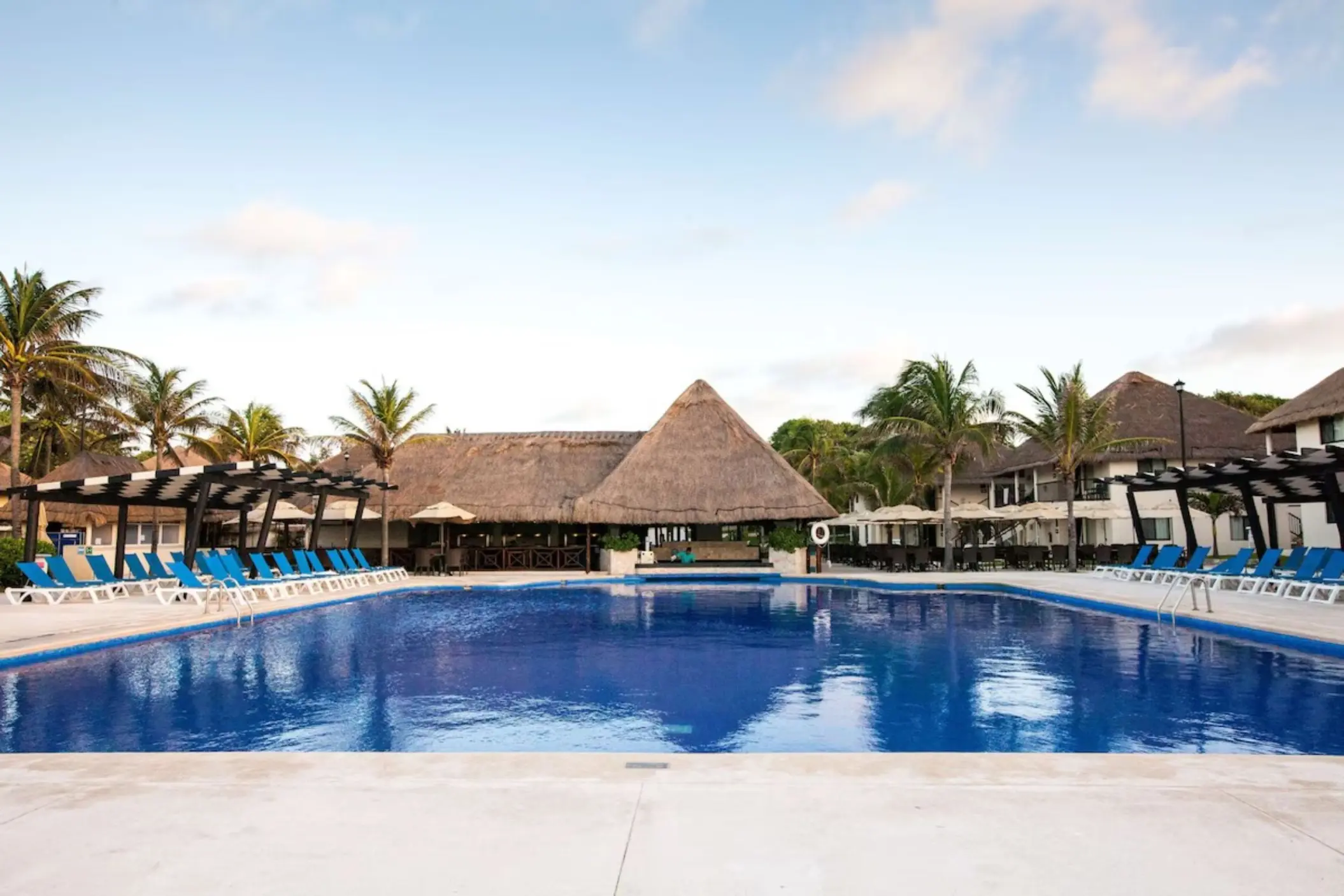 pool with poolside bar at Allegro Playacar
