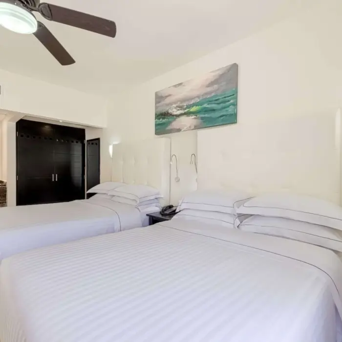 room with two beds at Allegro Playacar