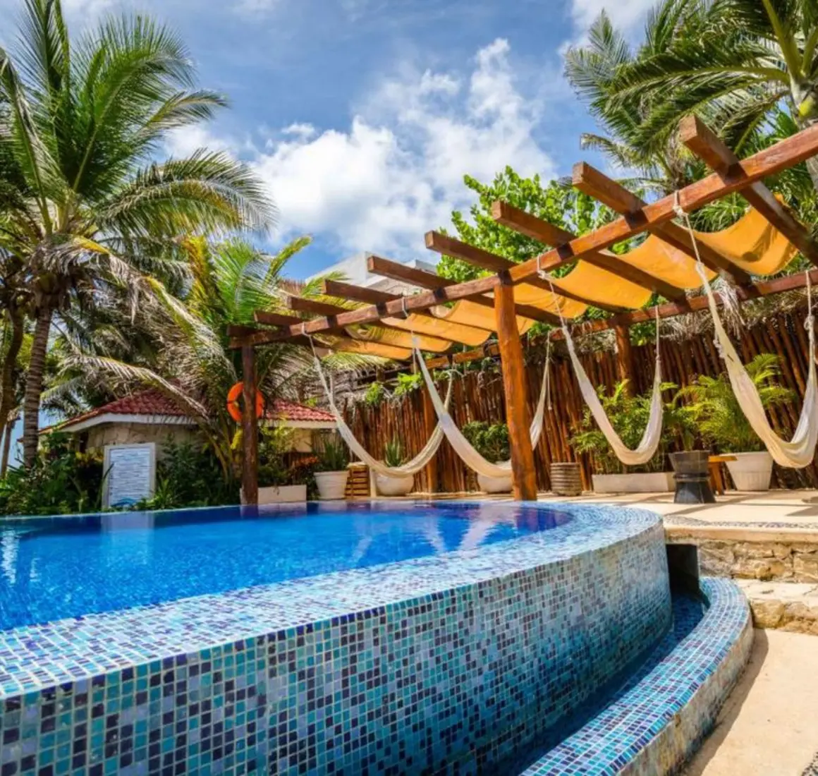 pool and poolside hammocks at Ana y Jose Hotel