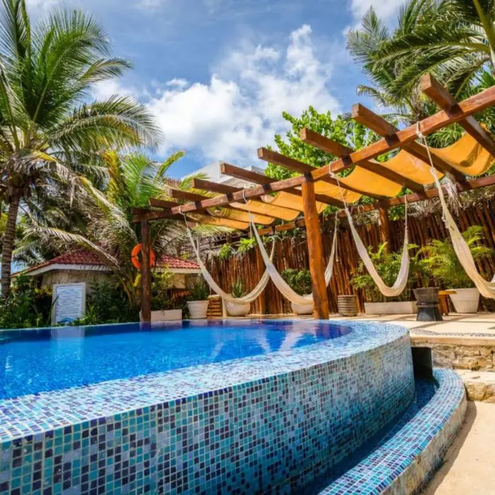 pool and poolside hammocks at Ana y Jose Hotel