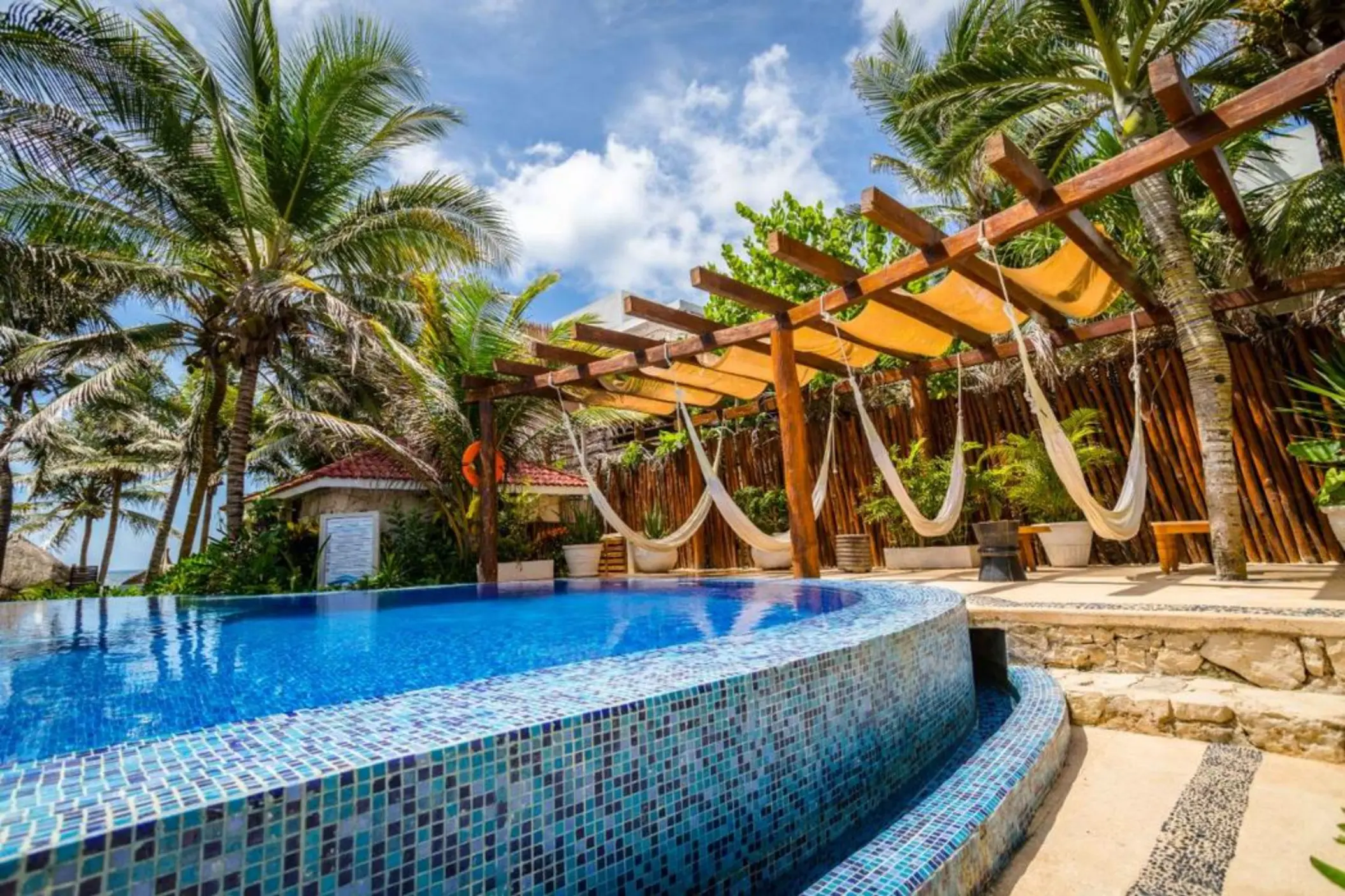 pool and poolside hammocks at Ana y Jose Hotel