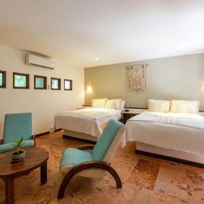 room with two beds at Ana y Jose Hotel