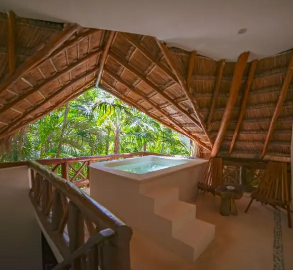 tub with a view of room at Ana y Jose Hotel