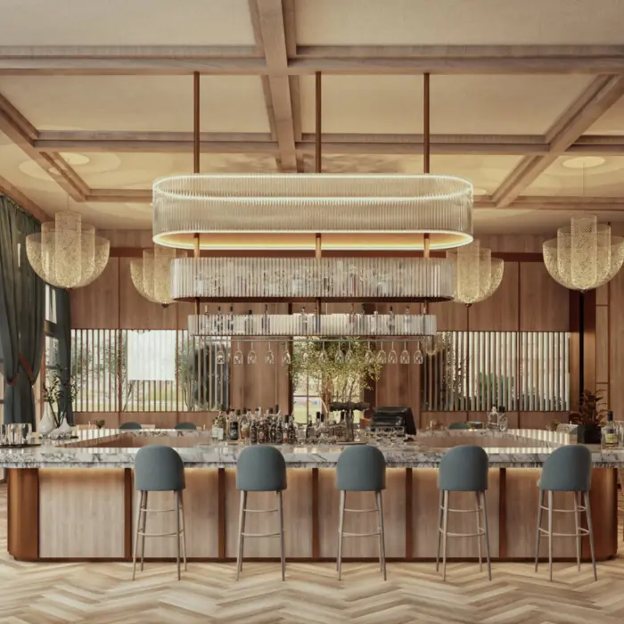 A beautifully designed bar area at AVA Cancun with elegant lighting and a light wood finish.