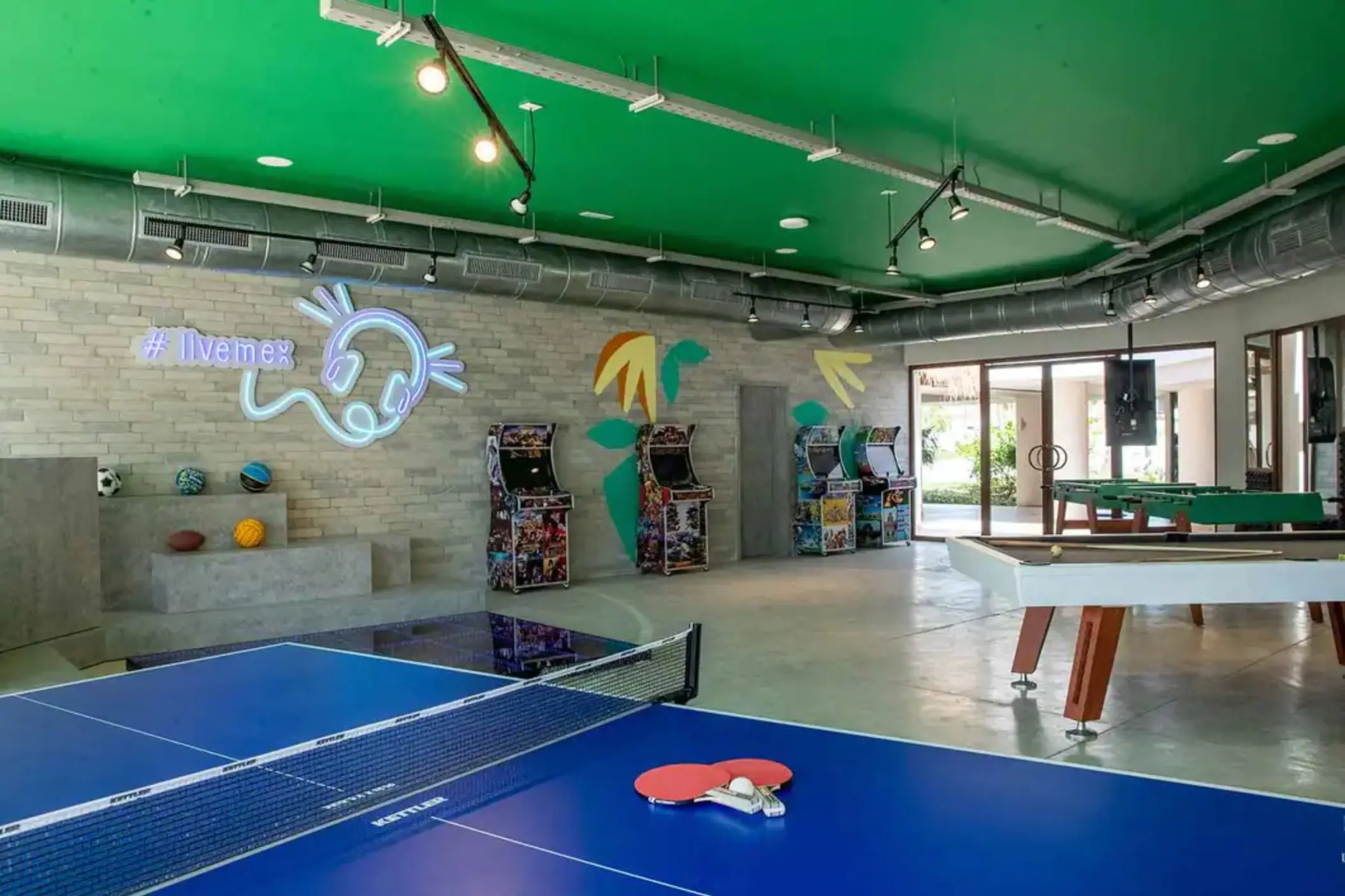 teens play zone with pool and table tennis and arcade games at Bahia Principe Grand Tulum