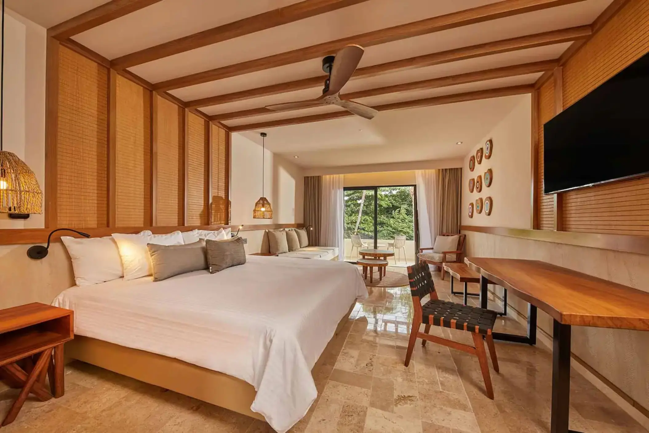 suite with rustic wooden fittings at Bahia Principe Luxury Akumal