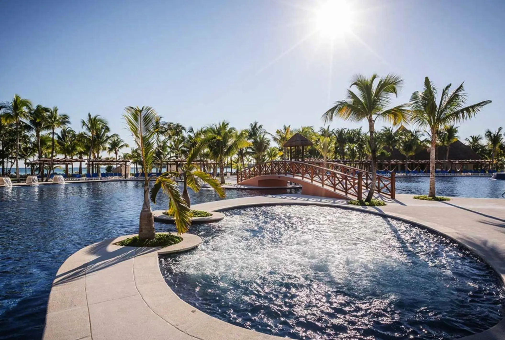 pool at Barcelo Maya Caribe with bridge over it