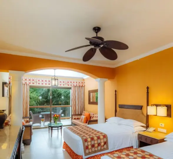 junior suite with two beds and tropical view at Barcelo Maya Palace