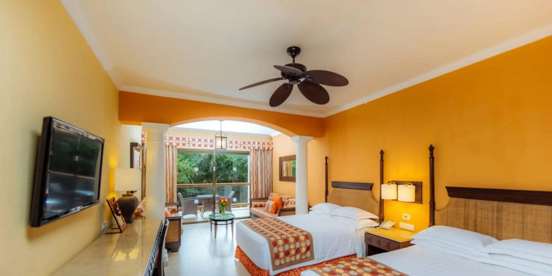 junior suite with two beds and tropical view at Barcelo Maya Palace
