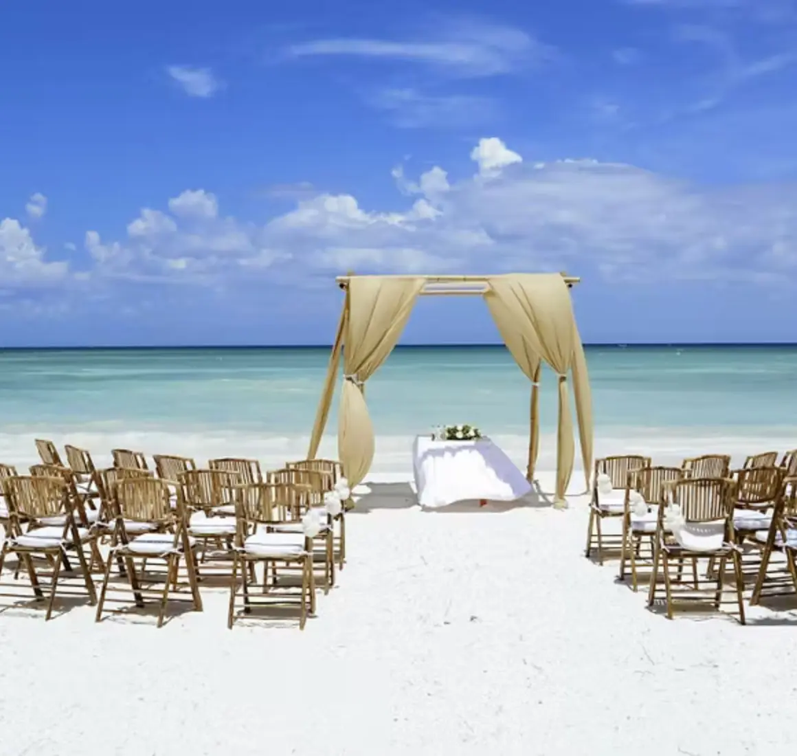 beach wedding setup at Barcelo Maya Tropical