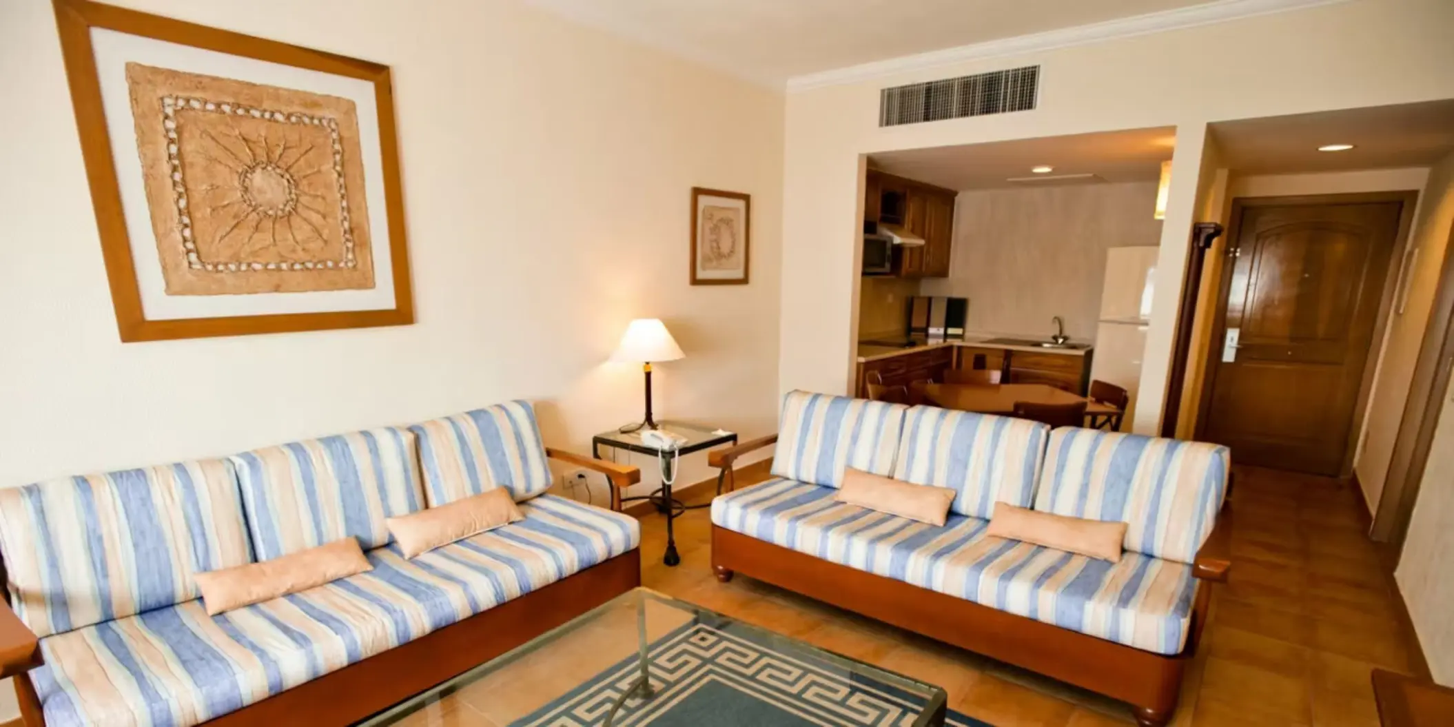 living room of a suite at Barcelo Maya Tropical