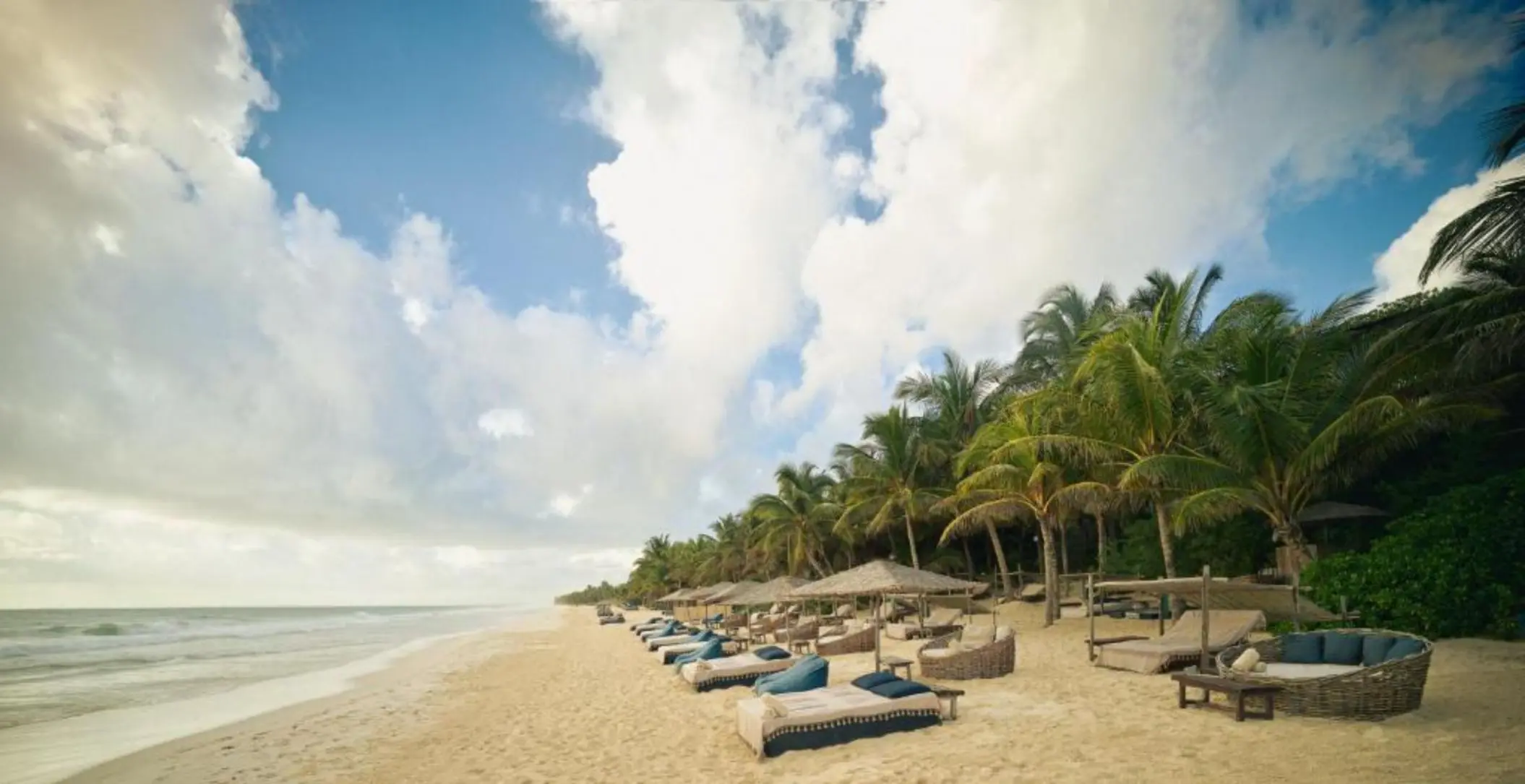 beach with loungers at Be Tulum resort