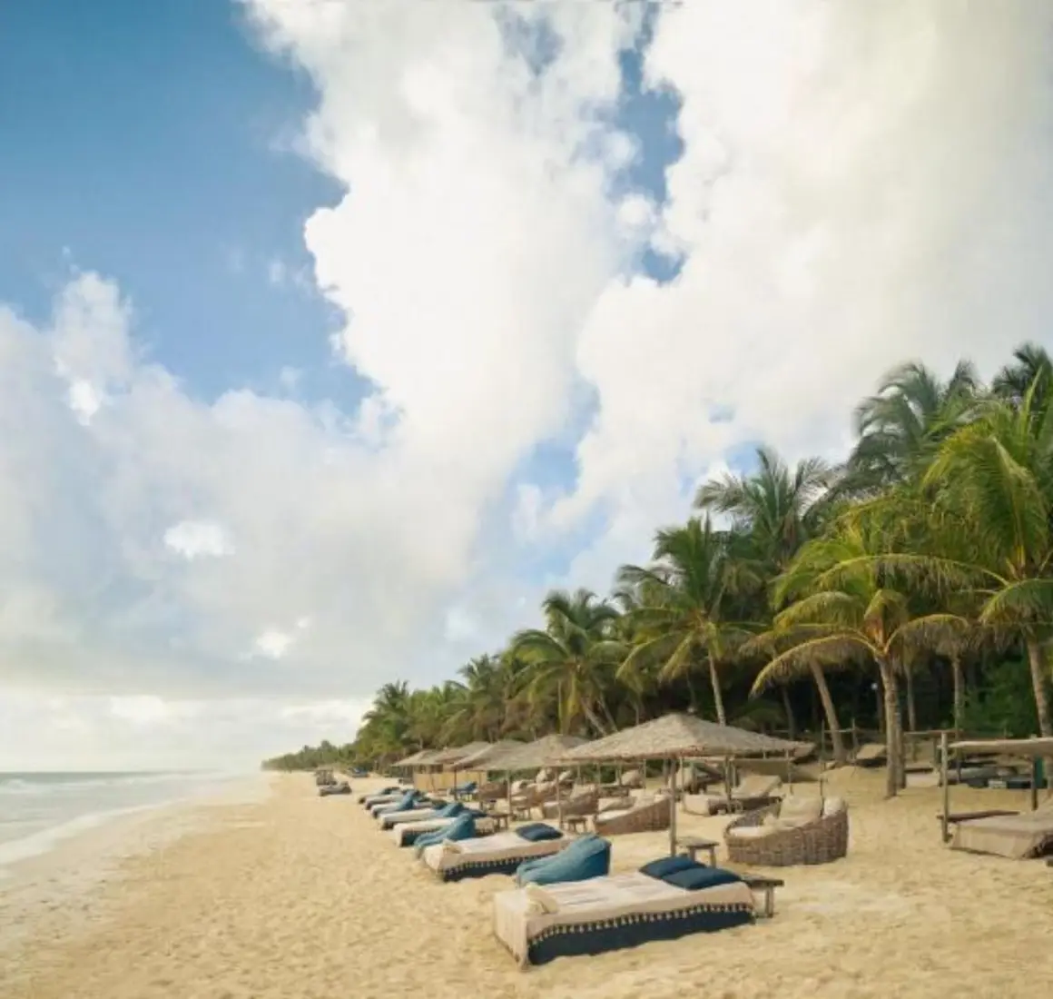 beach with loungers at Be Tulum resort