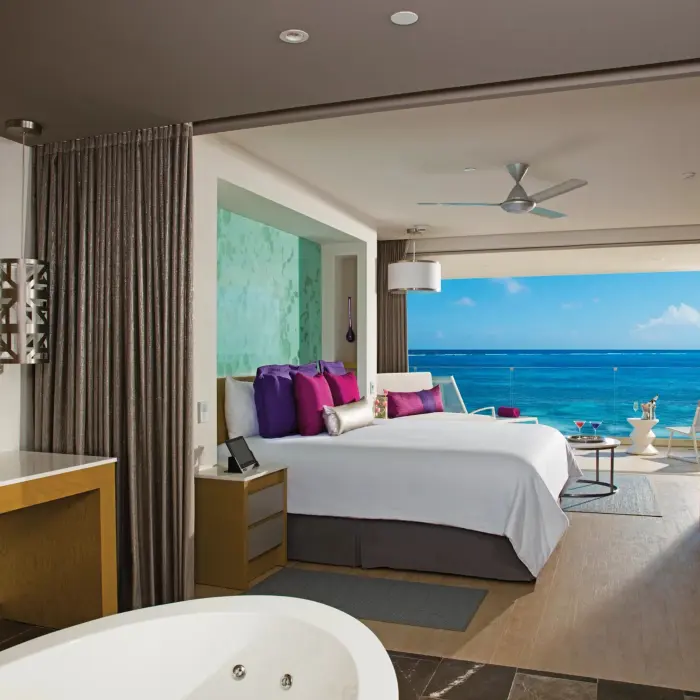 Master suite with panoramic ocean views, private terrace, and open-concept layout for coastal comfort.