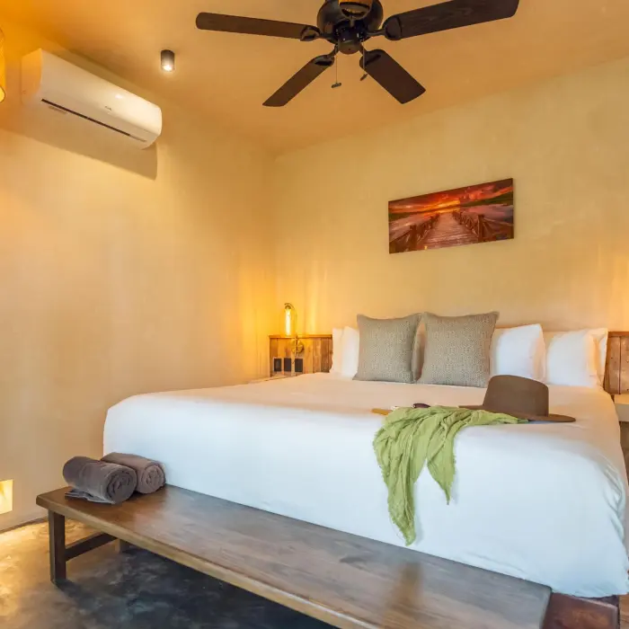 suite with king bed at Casa Ganesh tulum