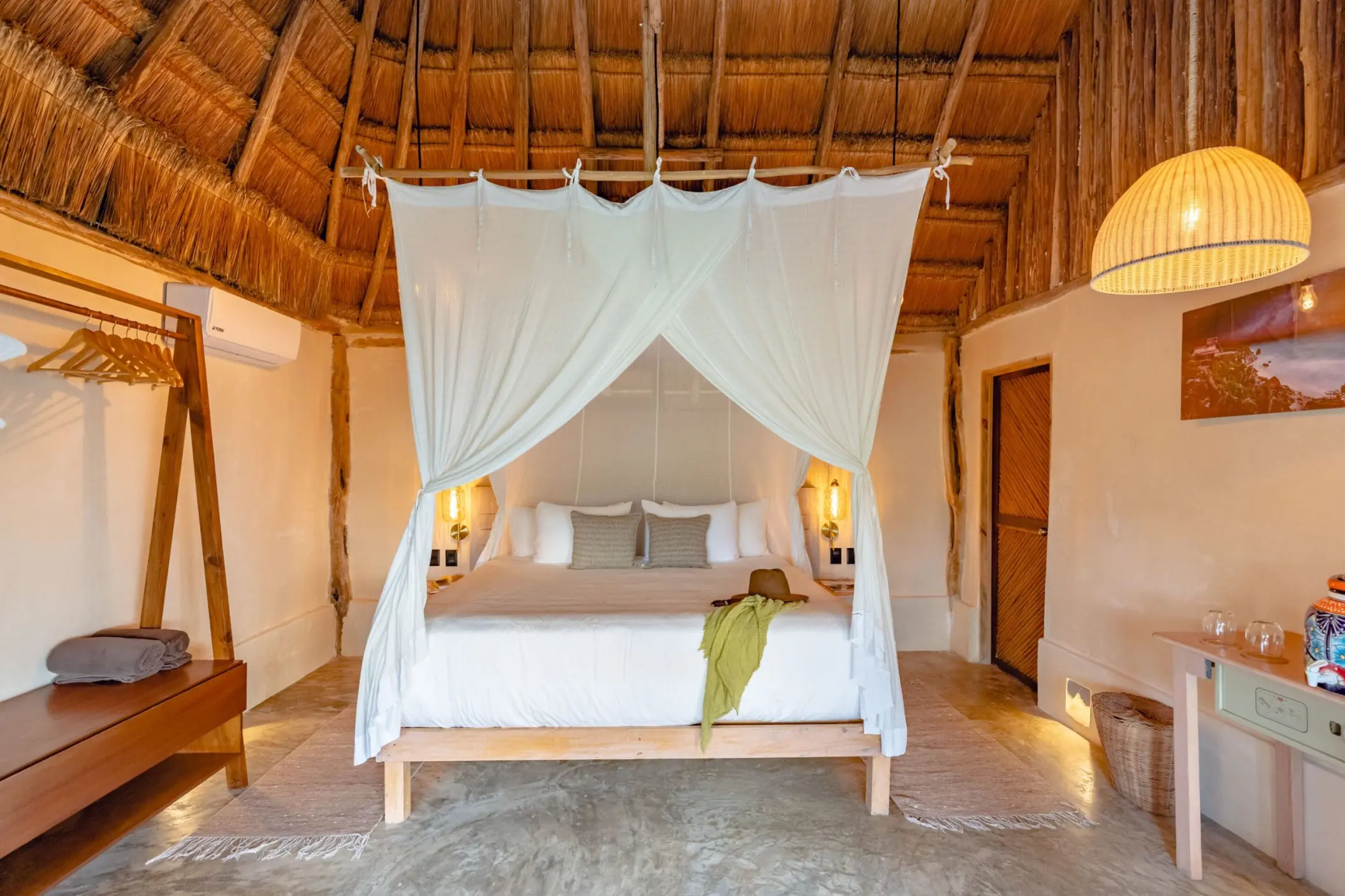 suite with poster bed at Casa Ganesh tulum