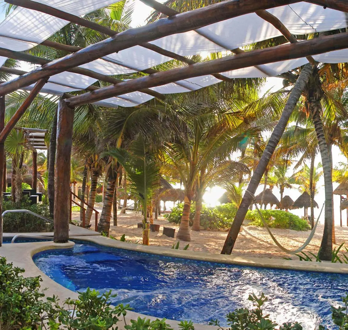 beach and pools at Catalonia Royal Tulum