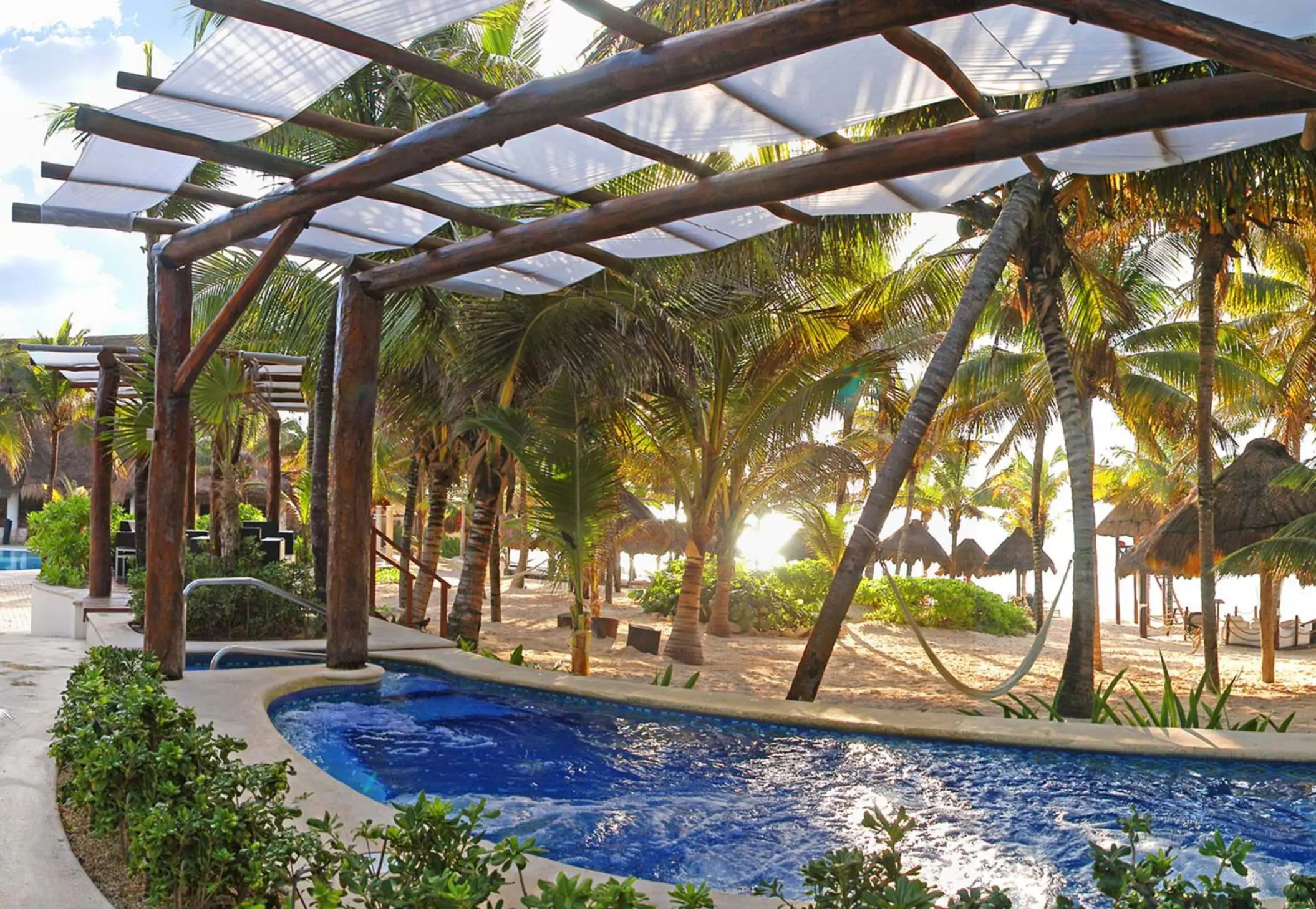beach and pools at Catalonia Royal Tulum