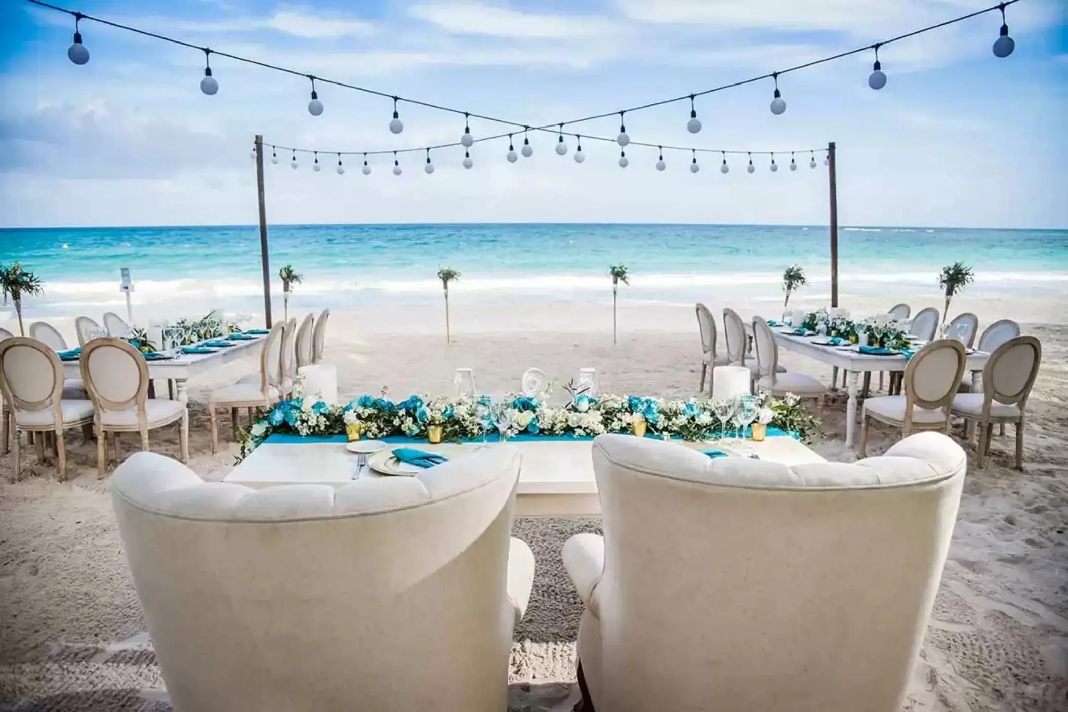 beach reception setup at Catalonia Royal Tulum