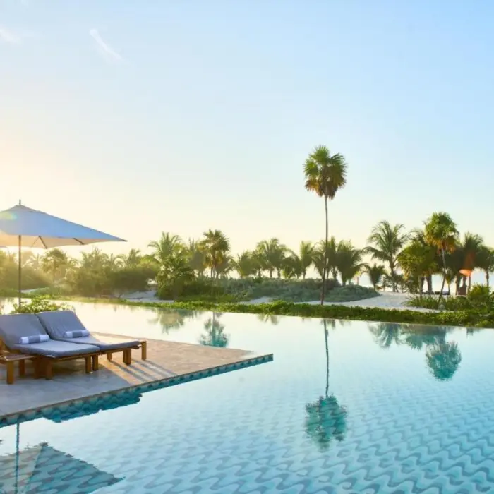 pool with loungers at Chable Maroma