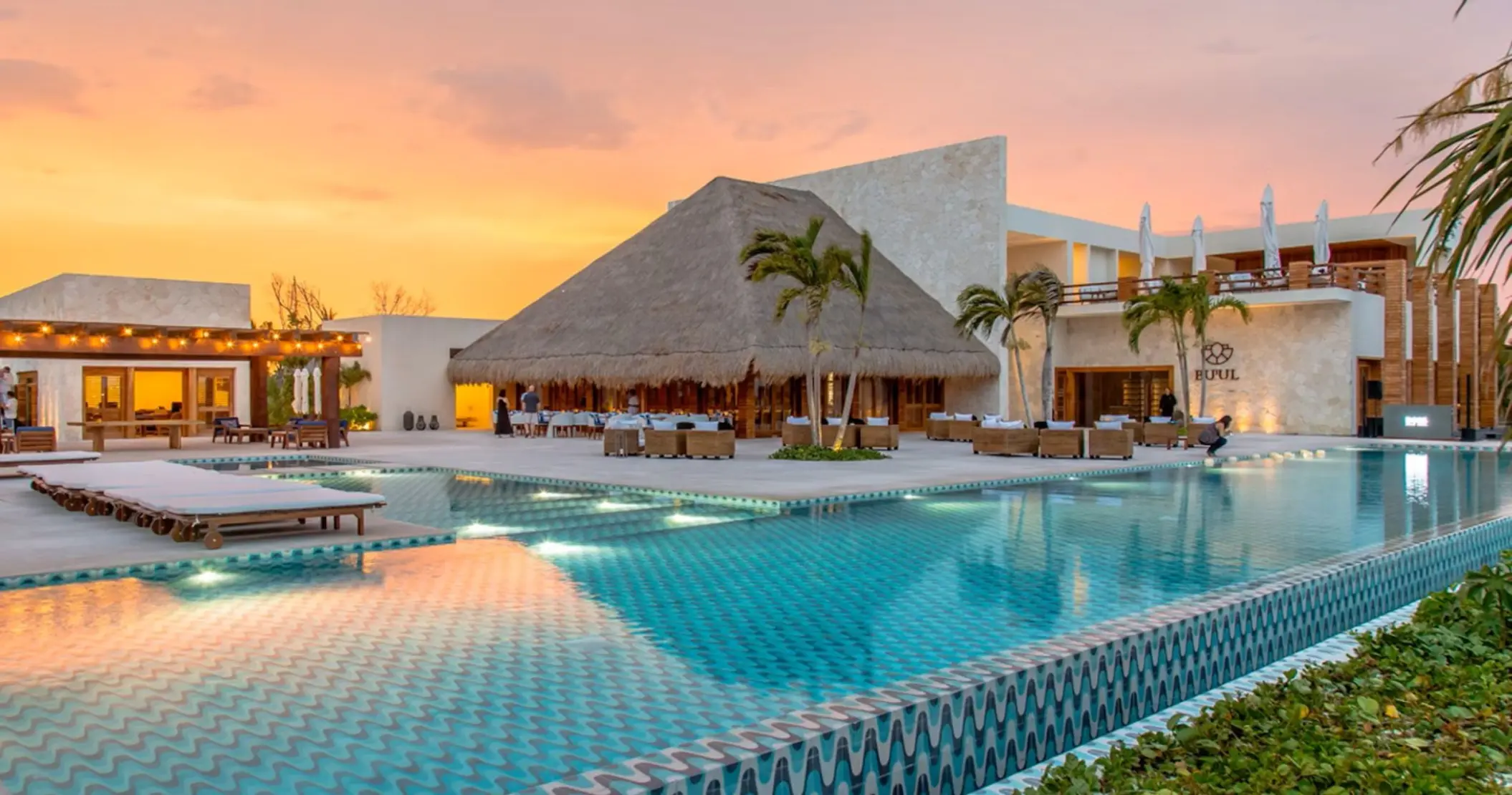 sunset over the pool at Chable Maroma