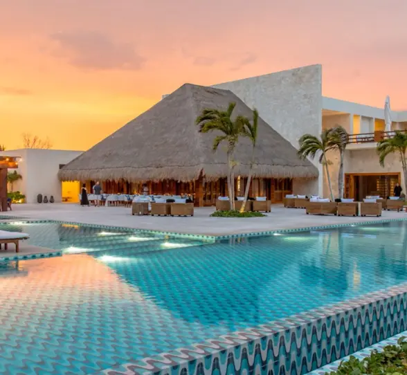 sunset over the pool at Chable Maroma