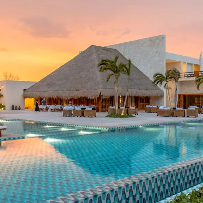 sunset over the pool at Chable Maroma