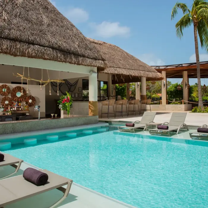 Why leave the water when the bar comes to you? Sip, swim, repeat at this laid-back swim-up spot.