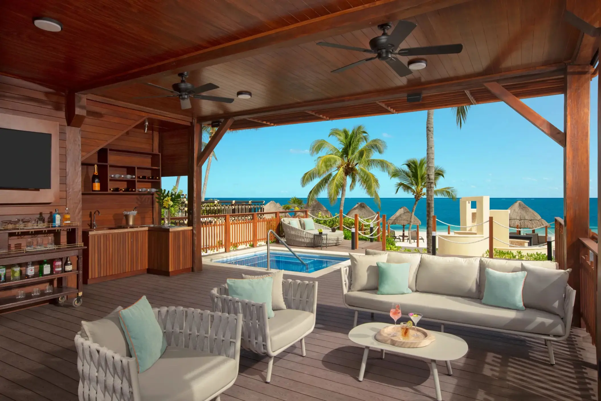 Two-story beach cabana with upper sun deck, plunge pool and lounge space.